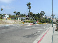 Four lanes separated by a median provided excess vehicle capacity. Space was needed for bicyclists and pedestrians.