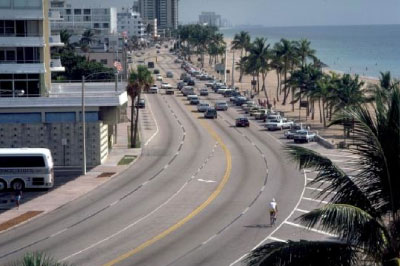 Overhead view of busy roadway with cyclist