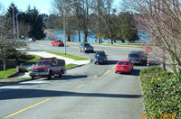 Curb realignment reduced the turning radius, forcing turning vehicles to slow. Crossing distance was also narrowed.