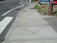 Bicyclist loop detector signal activation at one of the trail crossings.