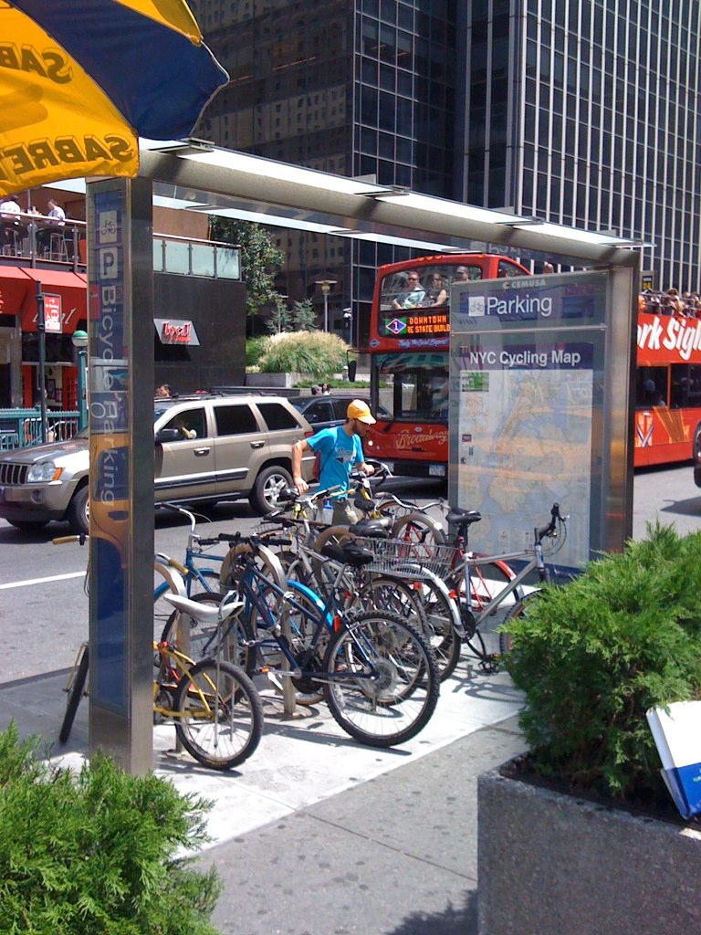 A bicycle parking shelter, featuring a cycling map.